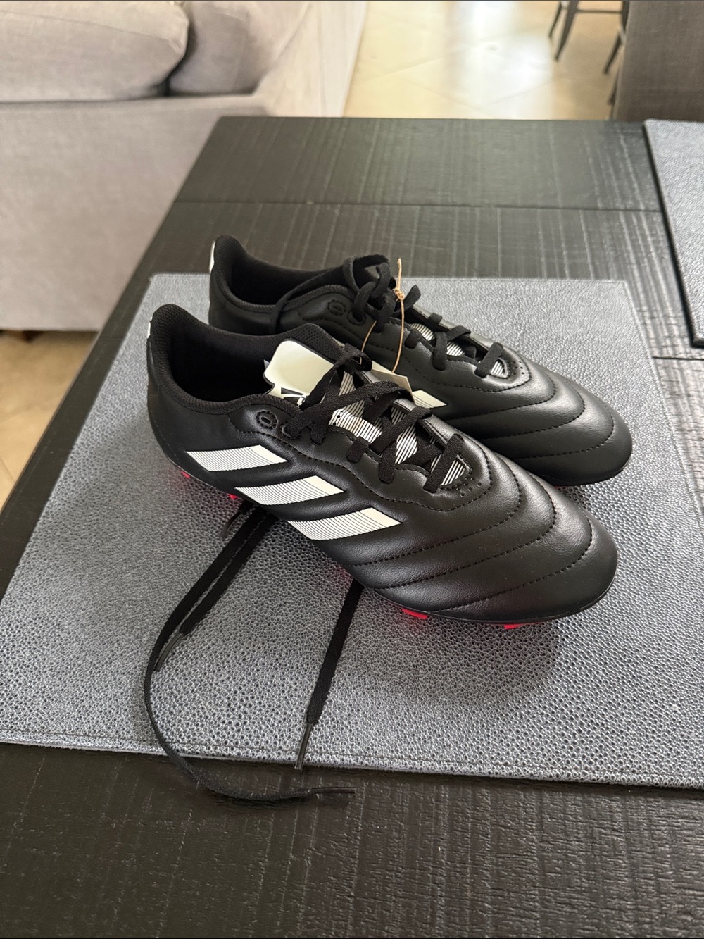 adidas Men’s Black Soccer Cleats with White Stripes